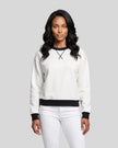 Model wearing the Athlesi TrackLine Heritage Sweatshirt in white with black contrast trim, front view