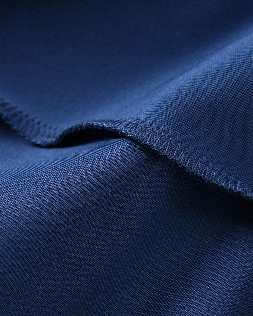 Soft stretch performance fabric detail on the TrackLine Junior Club Jacket in Royal Blue