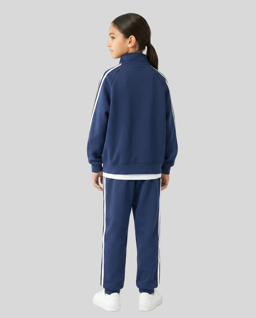Back view of a child wearing the TrackLine Junior Club Jacket in Royal Blue