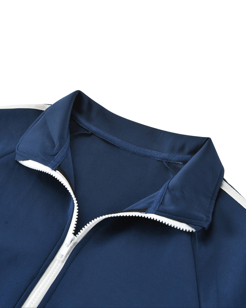 Closeup of stand collar and front zipper detail on the TrackLine Junior Club Jacket in Royal Blue