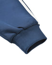 Contrast stripe sleeve detail on the TrackLine Junior Club Jacket in Royal Blue