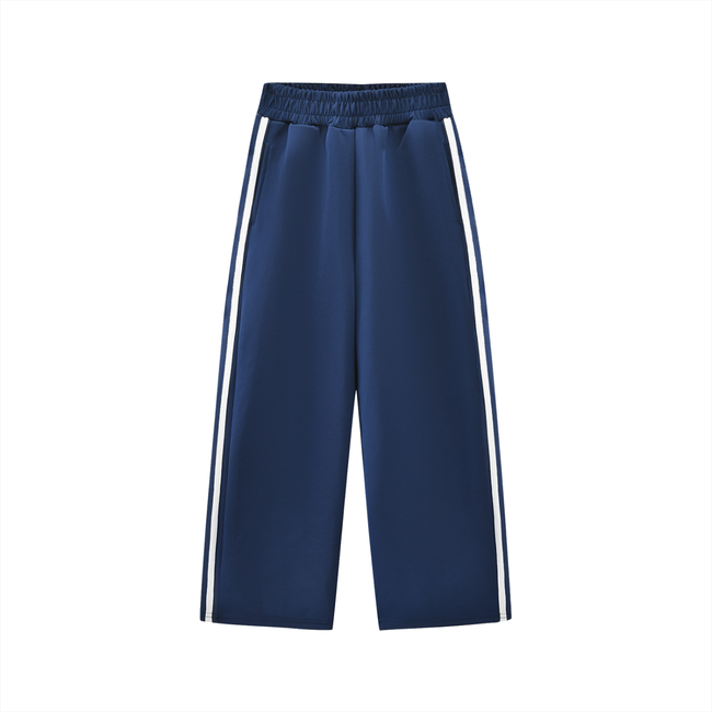 TrackLine Junior Club Pants in Royal Blue with contrast side stripes front view