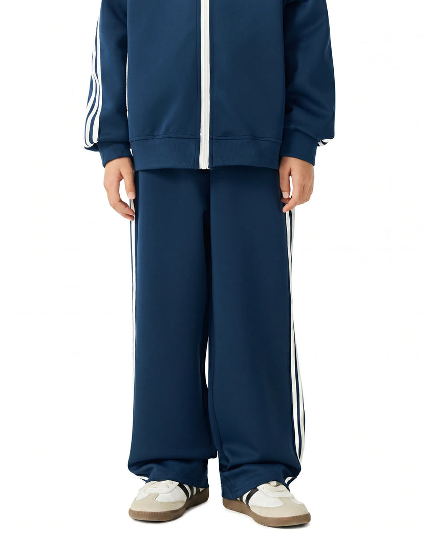 Child wearing the TrackLine Junior Club Pants in Royal Blue front view