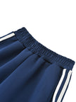 Elastic waistband detail on the TrackLine Junior Club Pants in Royal Blue