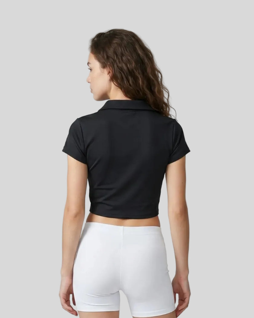 Lower body back styling view featuring the Athlesi TrackLine Lapel Crop Top in black