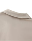 Back collar detail closeup of the Athlesi TrackLine Lapel Crop Top in light coffee