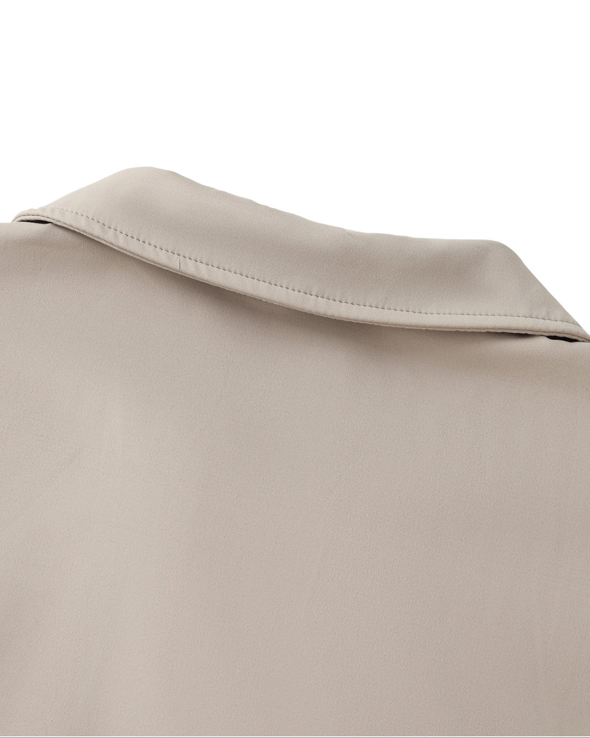 Back collar detail closeup of the Athlesi TrackLine Lapel Crop Top in light coffee