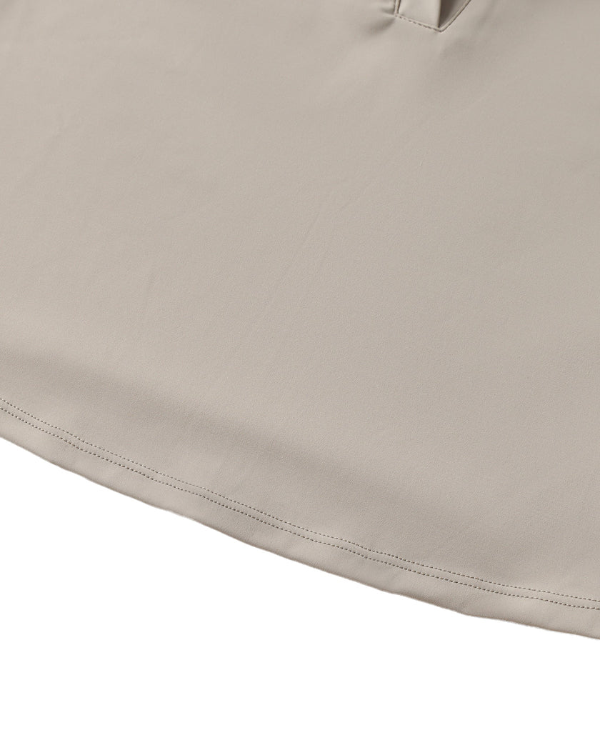 Hem detail closeup of the Athlesi TrackLine Lapel Crop Top in light coffee