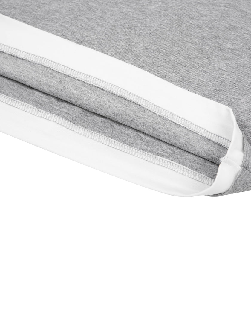 Bottom hem detail of TrackLine Lounge Halter Tank in soft gray stretch cotton