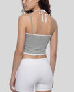 Back angle closeup of flower gray and white TrackLine Lounge Halter Tank showing dual-strap halter