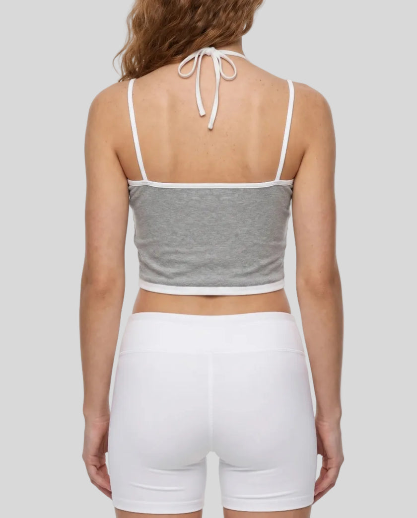 Back view of model wearing TrackLine Lounge Halter Tank featuring open halter silhouette