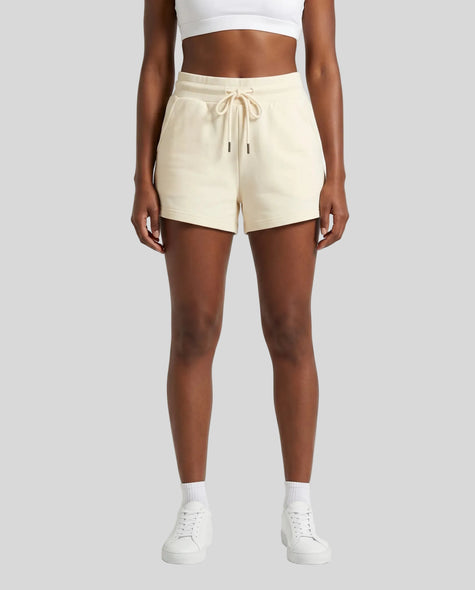 Model wearing TrackLine Lounge Shorts in apricot front view
