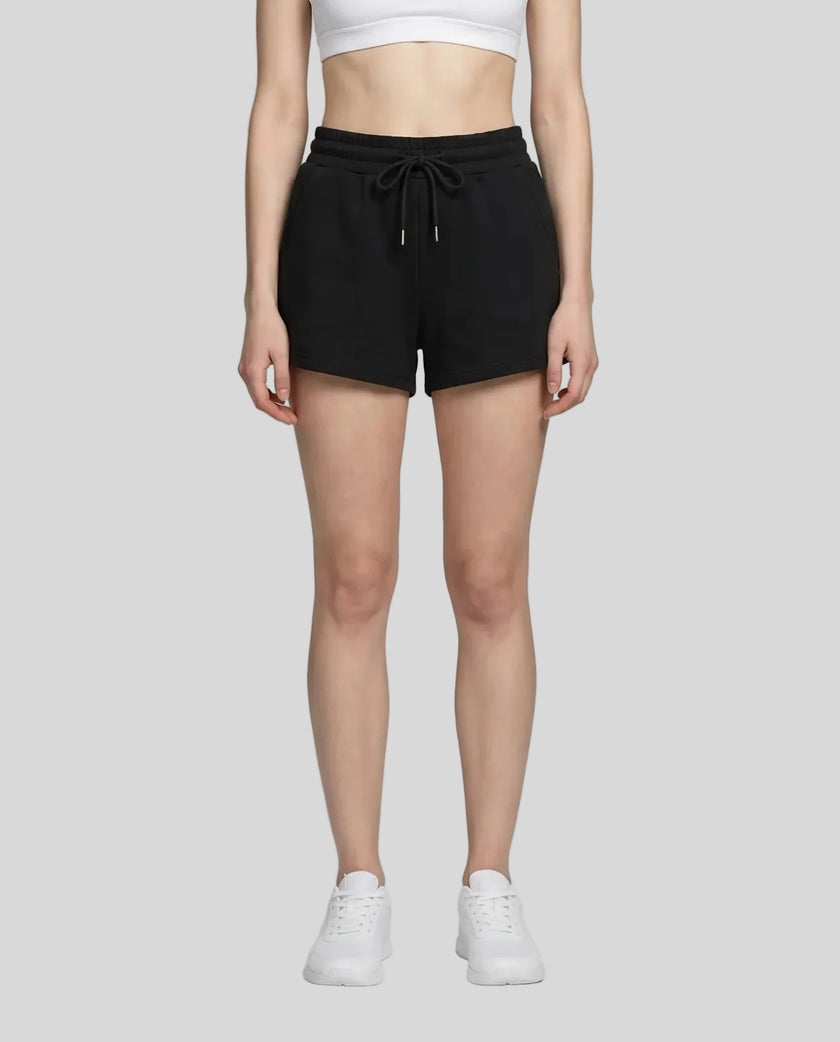 Model wearing TrackLine Lounge Shorts in black front view