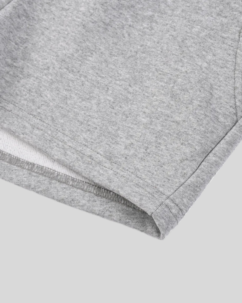 Hem detail of TrackLine Lounge Shorts featuring relaxed A-line silhouette
