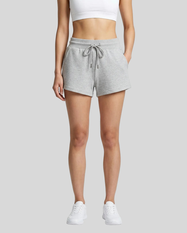 Model wearing TrackLine Lounge Shorts in flower gray front view
