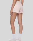 Angled back view of TrackLine Lounge Shorts showing relaxed lounge silhouette