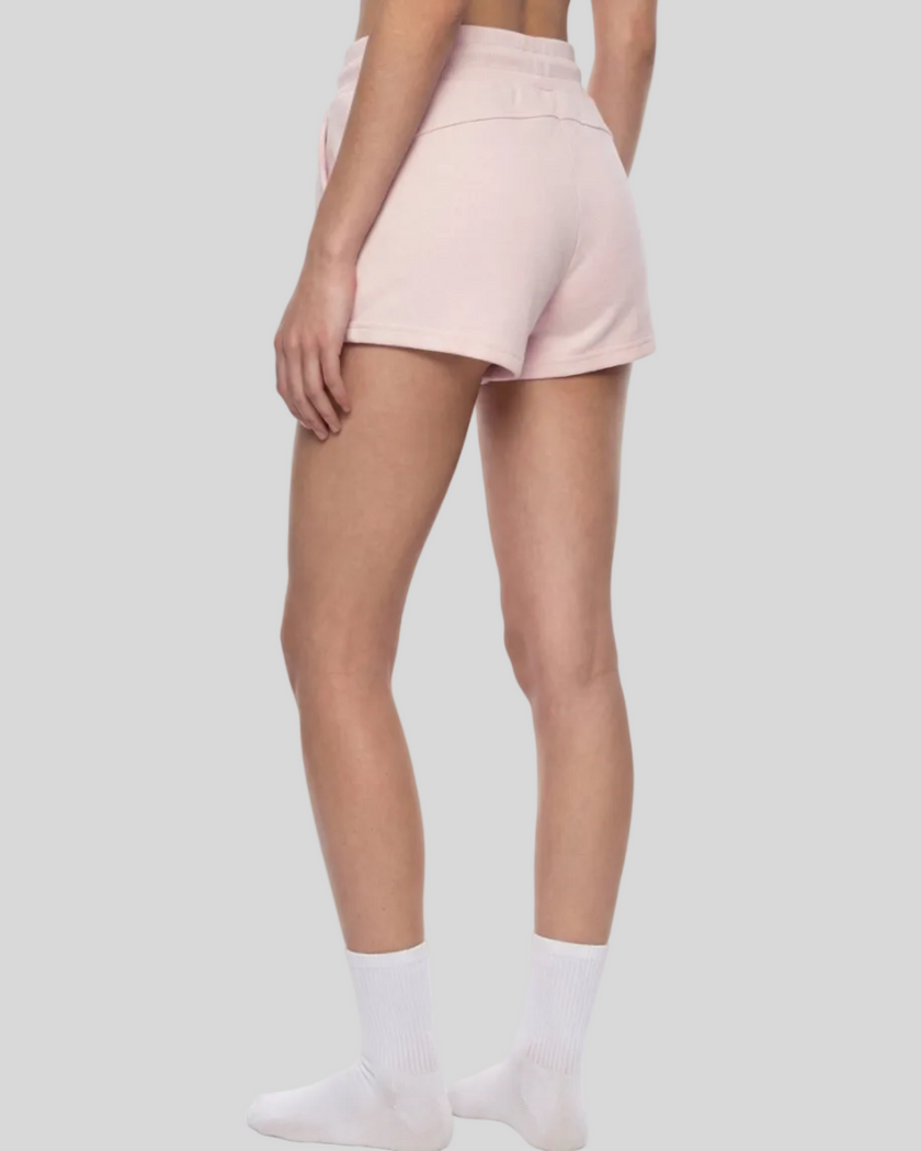 Angled back view of TrackLine Lounge Shorts showing relaxed lounge silhouette