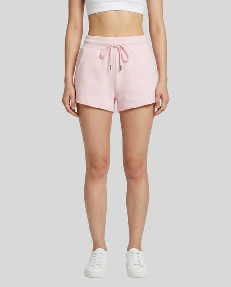 Model wearing TrackLine Lounge Shorts in pink front view