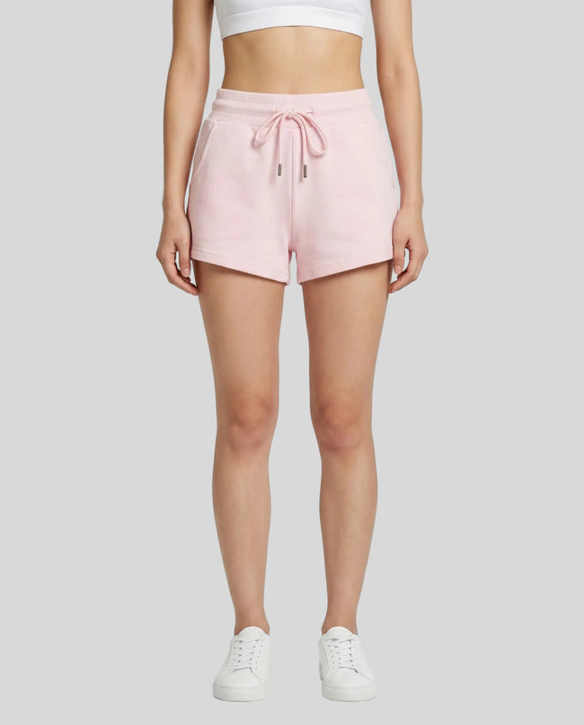 Model wearing TrackLine Lounge Shorts in pink front view