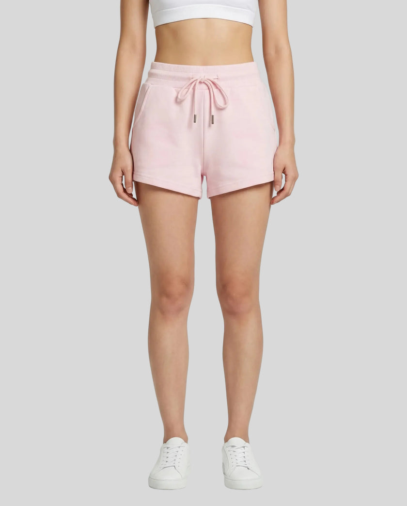 Model wearing TrackLine Lounge Shorts in pink front view