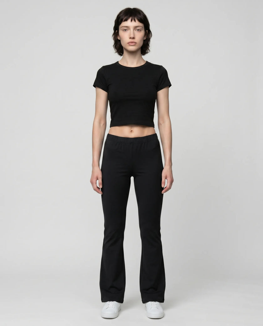 Full body front view of TrackLine Lounge Sweatpants and Trackline Lounge Tee in black