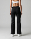 Back view of TrackLine Lounge Sweatpants in black with relaxed lounge silhouette