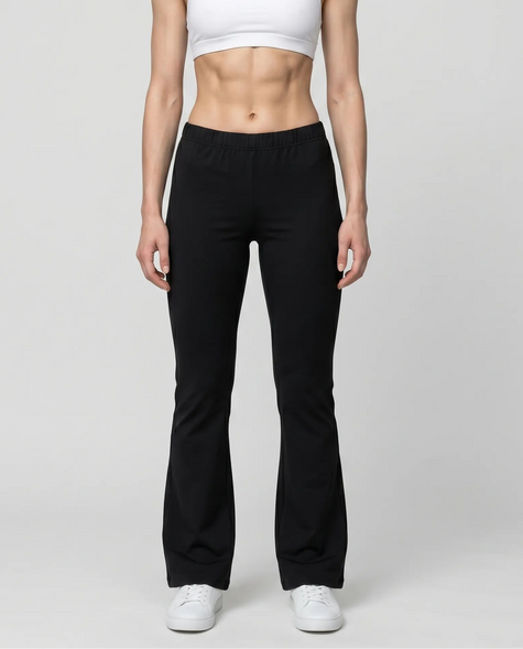 Woman wearing TrackLine Lounge Sweatpants in black front view with relaxed flared silhouette