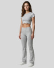 Full body front view of TrackLine Lounge Sweatpants and Trackline Lounge Tee in flower gray