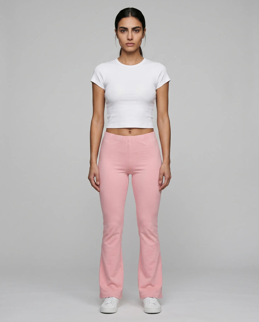 Full body front view of TrackLine Lounge Sweatpants in pink and Trackline Lounge Tee in white