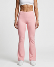 Woman wearing TrackLine Lounge Sweatpants in pink front view with relaxed flared silhouette