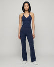 Full body front view of TrackLine Lounge Sweatpants and Trackline Halter Tank in royal blue