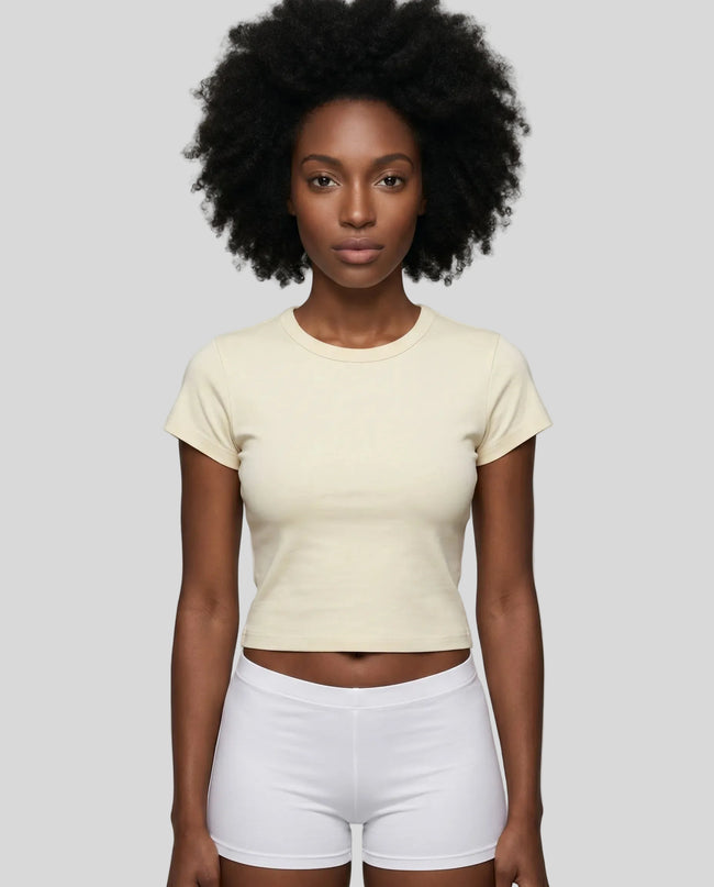 Model wearing TrackLine Lounge Tee in apricot front view