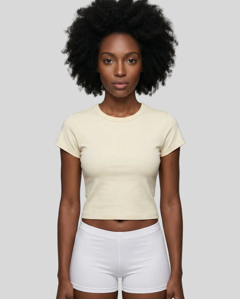Model wearing TrackLine Lounge Tee in apricot front view