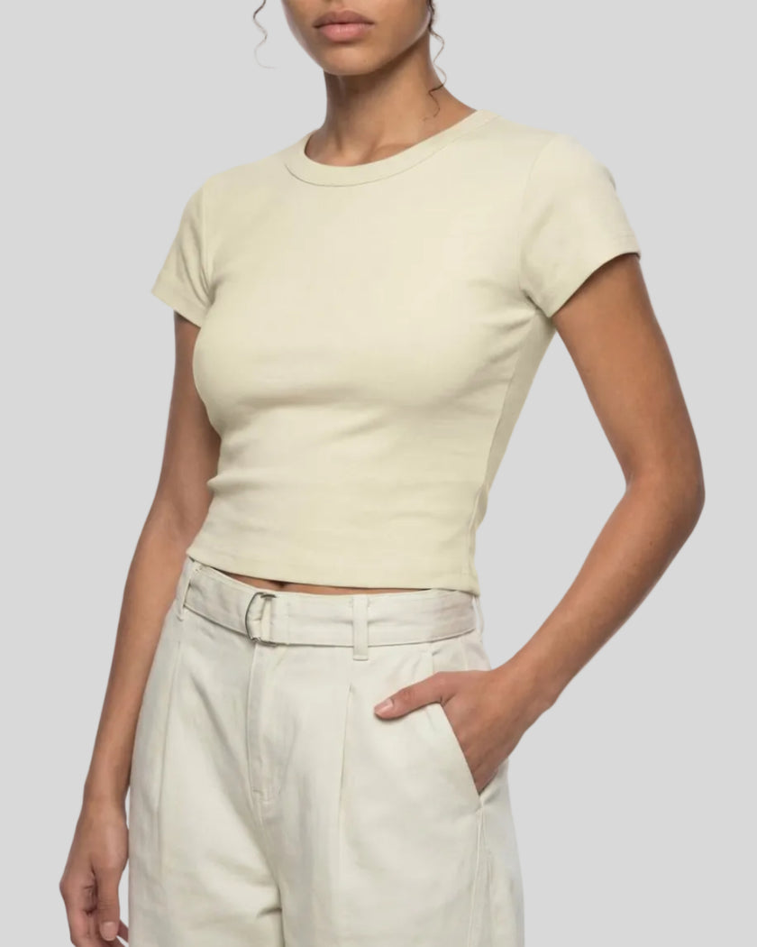 Angled front view of model wearing TrackLine Lounge Tee
