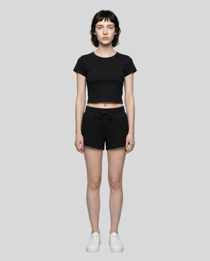 Front view of model wearing TrackLine Lounge Tee in black with matching Trackline Lounge Shorts