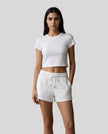 Front view of model wearing TrackLine Lounge Tee in white with matching Trackline Lounge Shorts