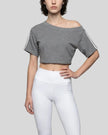 Front angled view of the Athlesi TrackLine Off-Shoulder Tee in gray with asymmetrical neckline styling