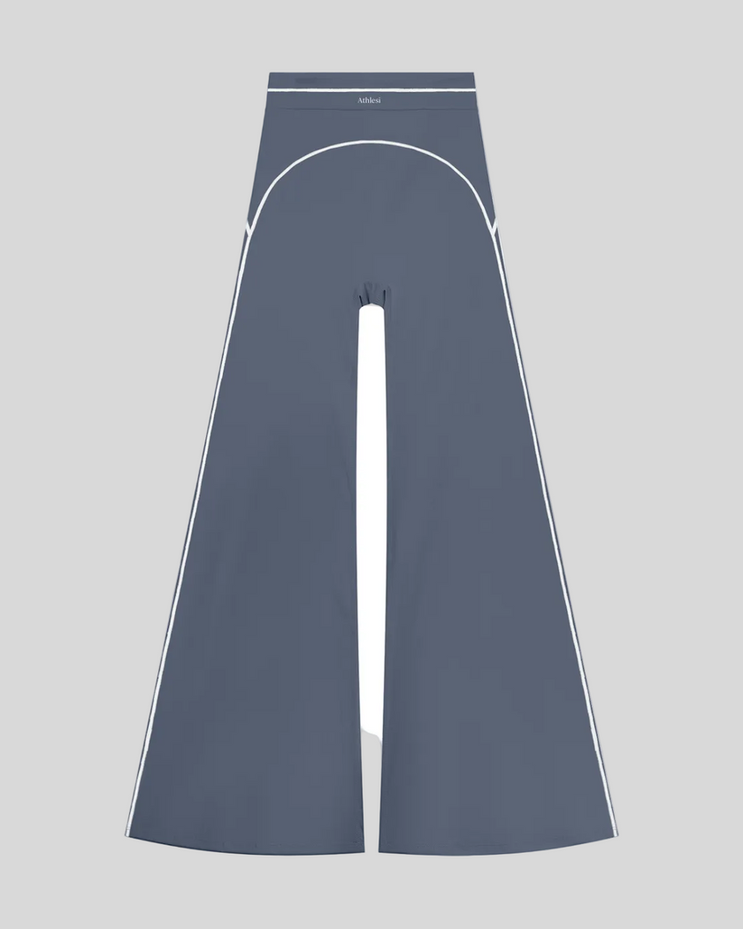 TrackLine Outline Flared Pants in Haze Blue front view featuring a high-rise waistband, contrast piping, and flared leg
