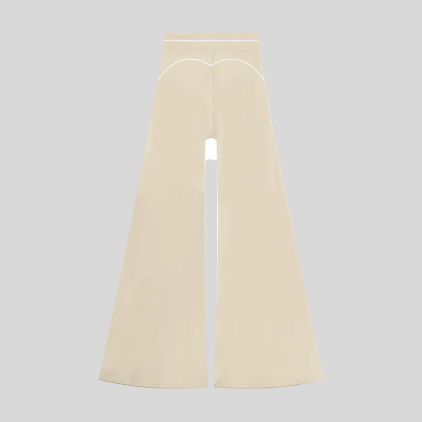 TrackLine Outline Flared Pants in Light Apricot back view showcasing the sculpting back seam and flared silhouette
