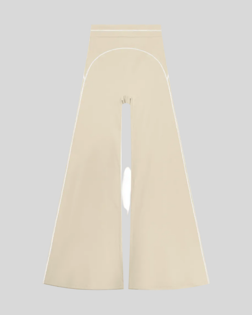 TrackLine Outline Flared Pants in Light Apricot front view featuring a high-rise waistband, contrast piping, and flared leg