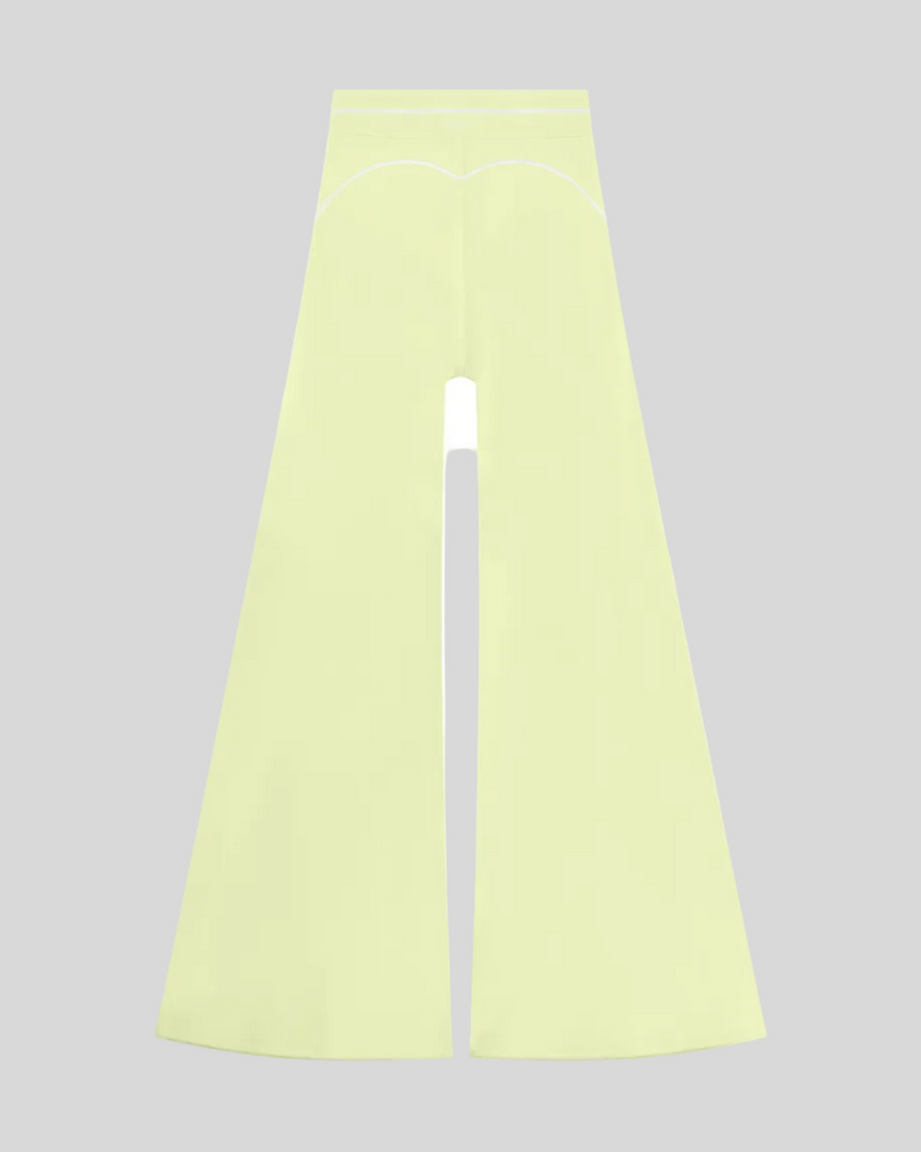TrackLine Outline Flared Pants in Light Green back view showcasing the sculpting back seam and flared silhouette