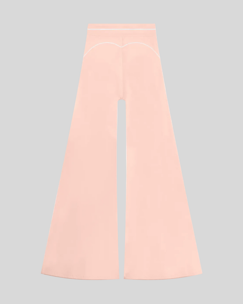 TrackLine Outline Flared Pants in Light Pink back view showcasing the sculpting back seam and flared silhouette