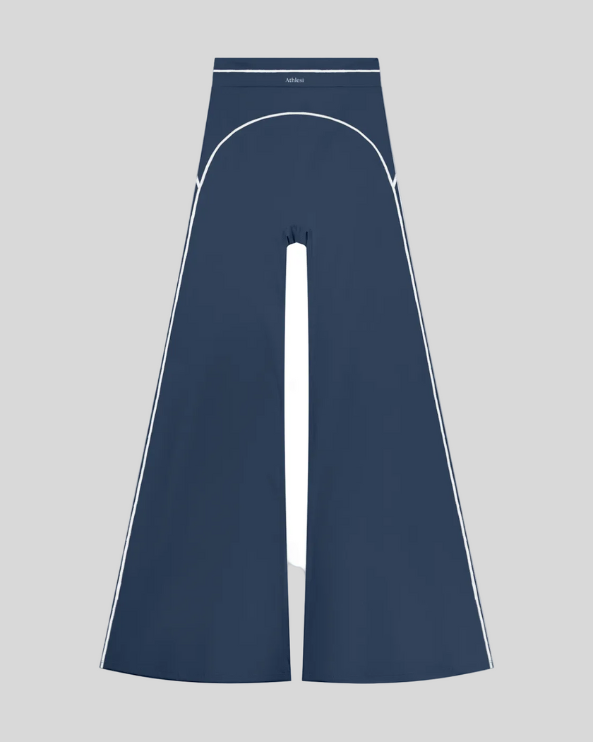 TrackLine Outline Flared Pants in Navy Blue front view featuring a high-rise waistband, contrast piping, and flared leg
