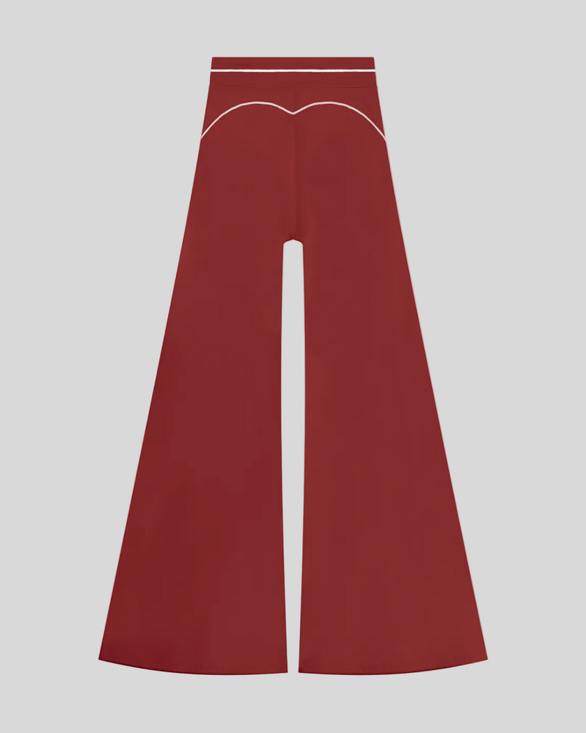 TrackLine Outline Flared Pants in Red back view showcasing the sculpting back seam and flared silhouette
