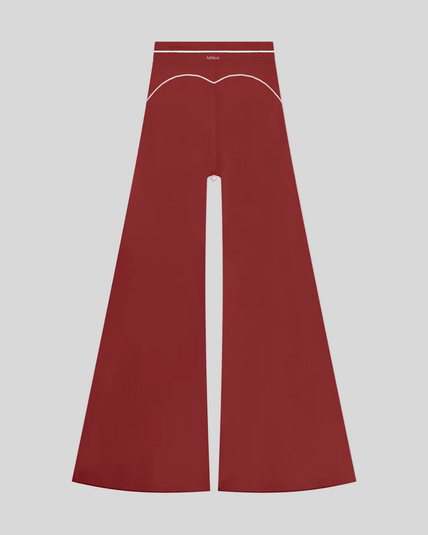 TrackLine Outline Flared Pants in Red back view showcasing the sculpting back seam and flared silhouette