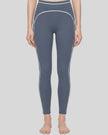 Model wearing the TrackLine Outline Leggings in Haze Blue viewed from the front