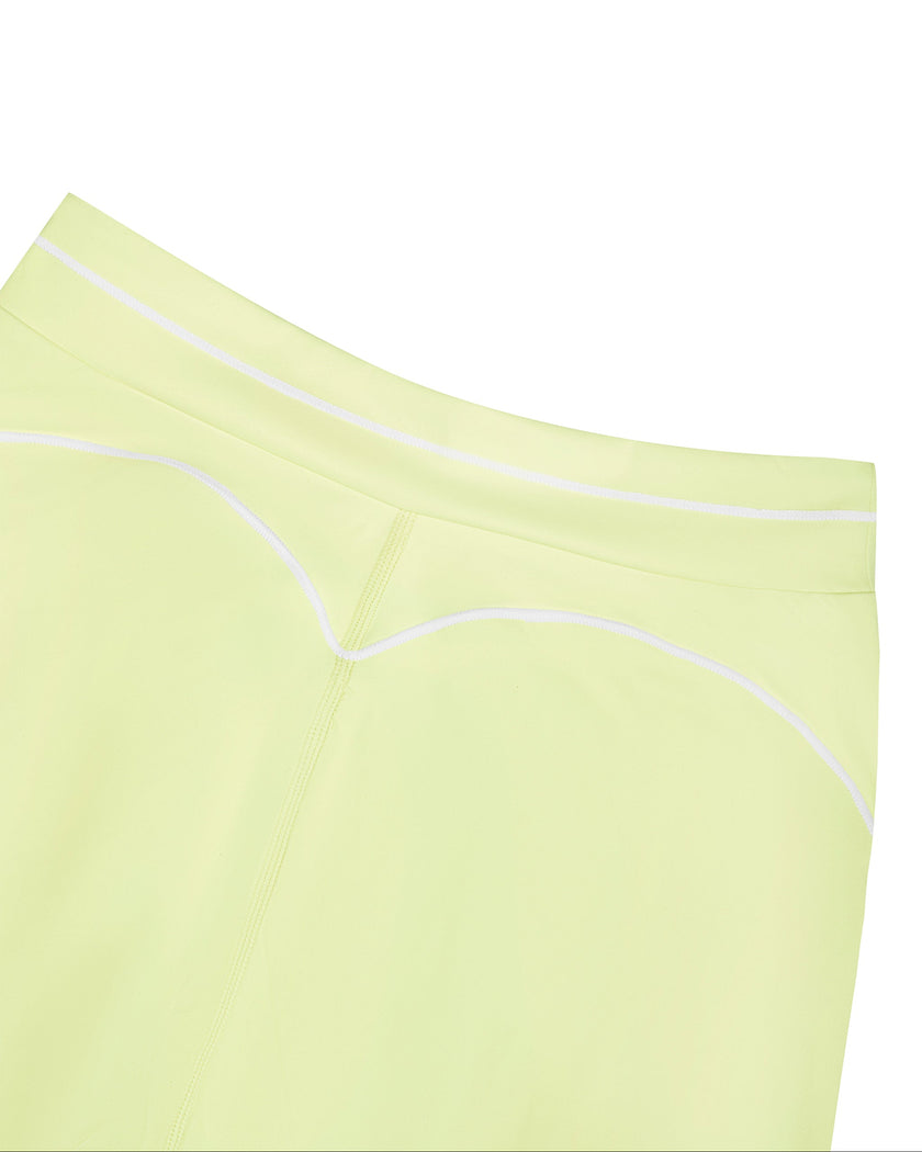 Close-up of the back waistband and contour seam on the TrackLine Outline Leggings in Light Green