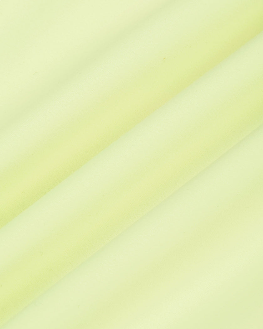 Close-up of the smooth stretch performance fabric used on the TrackLine Outline Leggings in Light Green