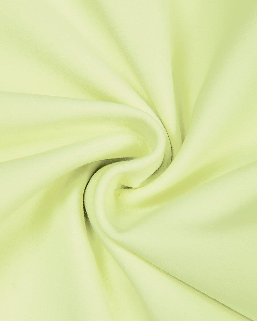 Detailed view of the premium stretch knit fabric and stitching on the TrackLine Outline Leggings in Light Green