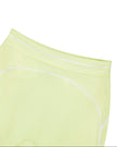 Close-up of the front high-rise waistband on the TrackLine Outline Leggings in Light Green